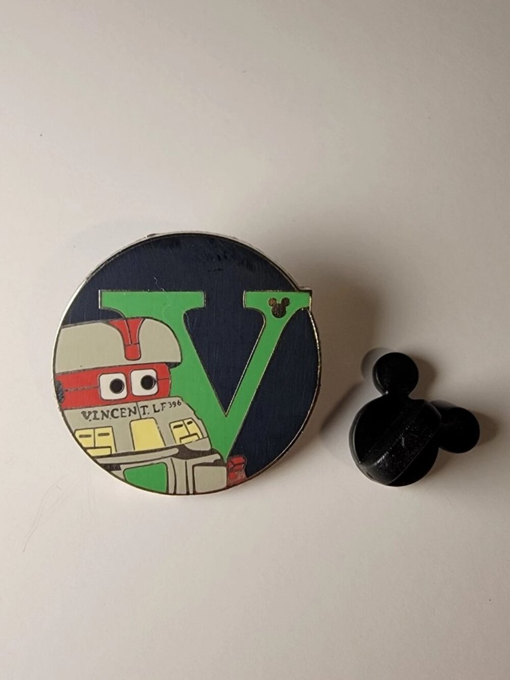 V.I.N.CENT V Monogram Button Hidden Mickey Disney Black Hole Enamel Trading Pin